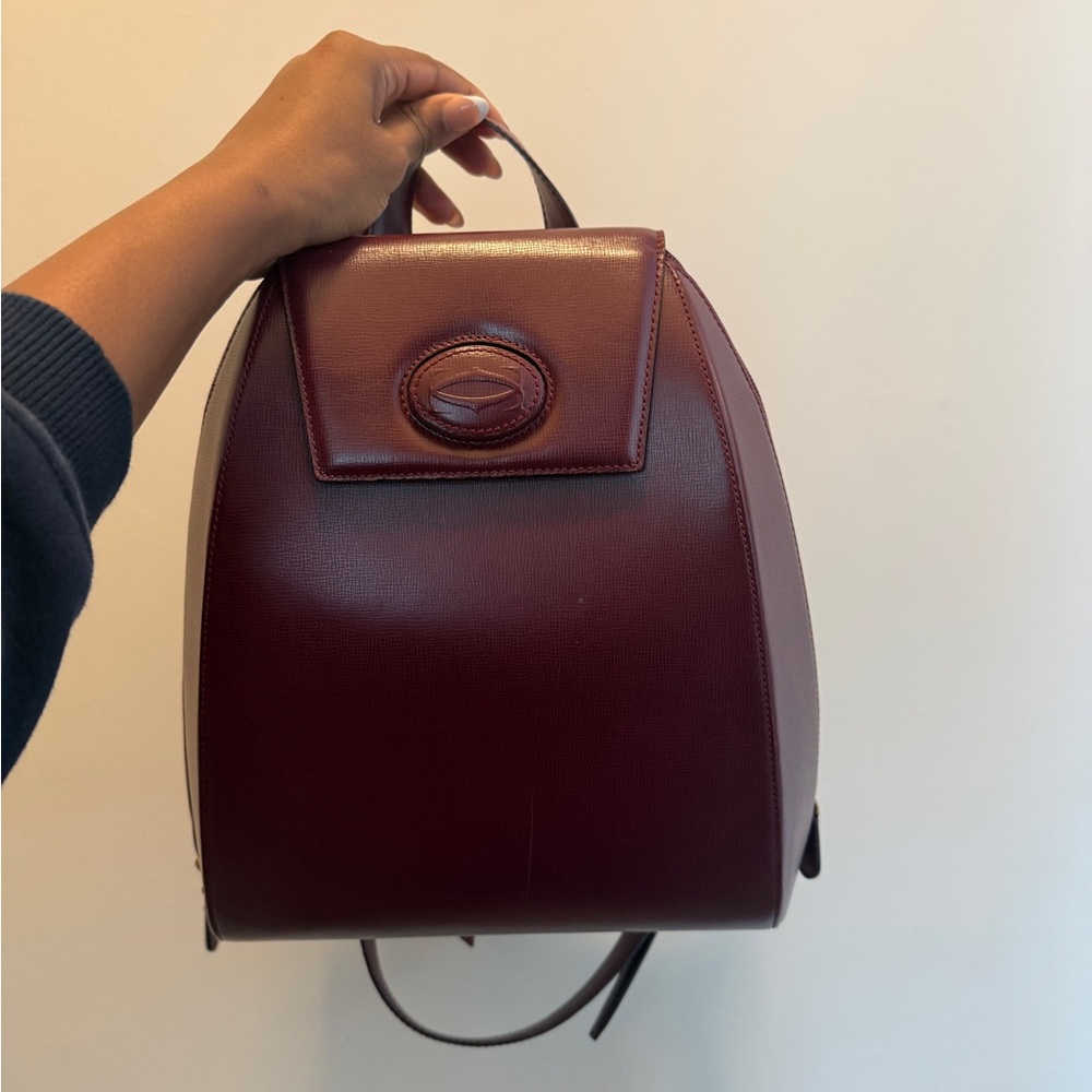 Elegant Cartier Bundle Burgundy Leather Backpack and Handbag